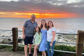 Family in front of a sunset in California